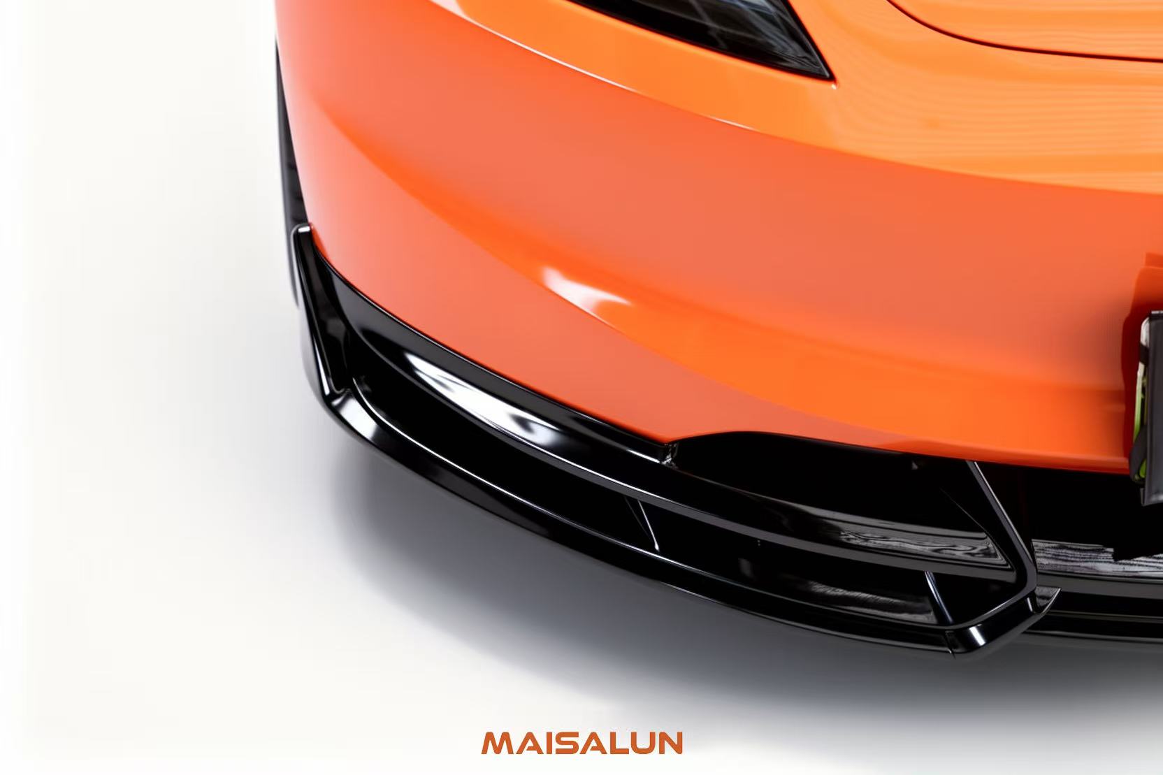 Close detail of a Model 3 front lip aero part